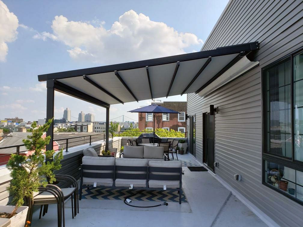 Custom retractable awnings in Charlotte, NC. Motorized and manual shade systems built for comfort, style, and long-term energy savings.