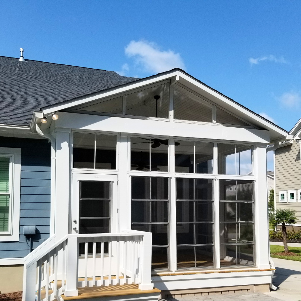 Expert sunroom builders constructing a custom addition with 2026-compliant structural footings engineered for Troutman's red clay soil and Lake Norman wind-load requirements.